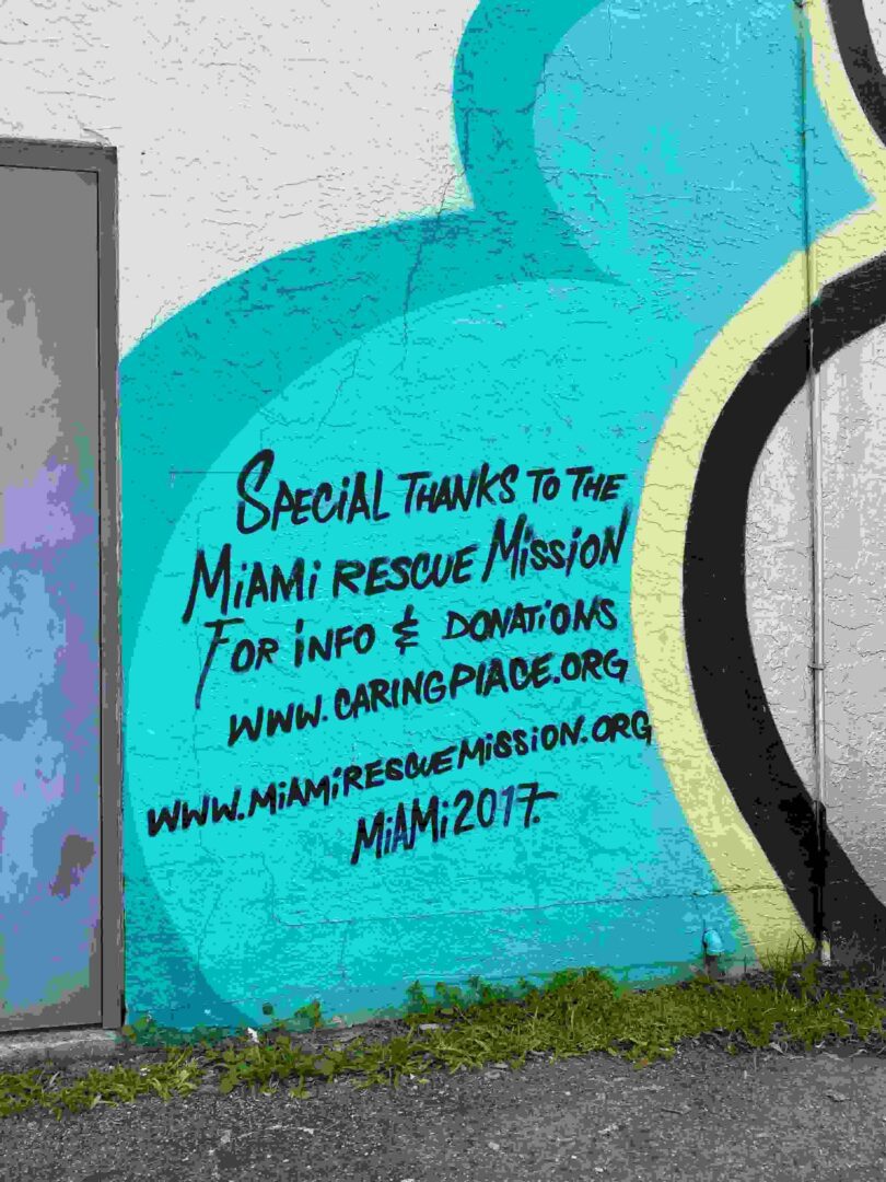 A mural of the miami rescue mission on a wall.